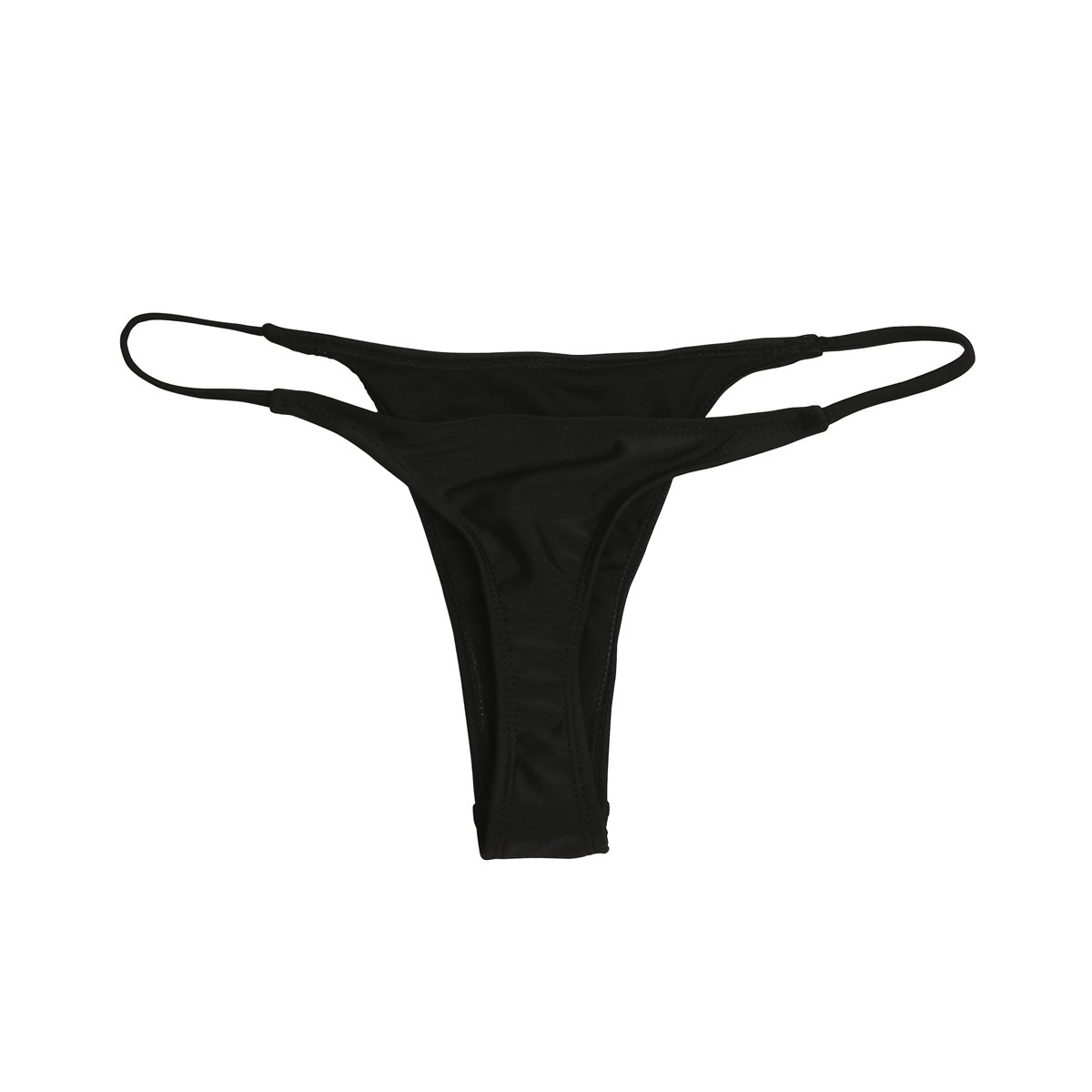 Bas de bikini tanga brésilien noir posé sur pierre claire avec un léger reflet d’eau.