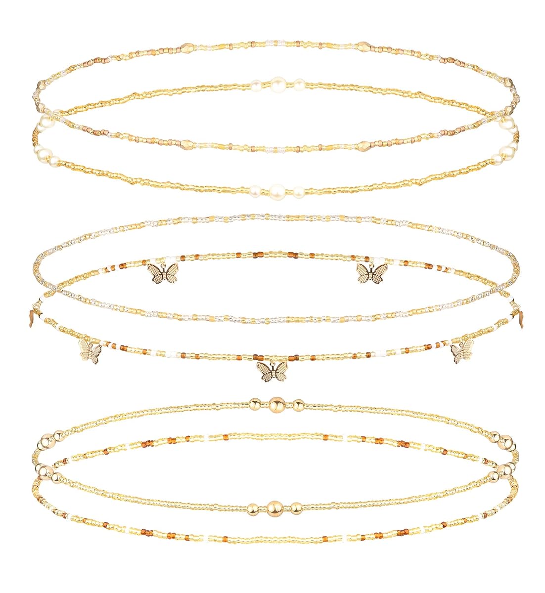 Six chaînes de taille en perles d’imitation blanc ou crème disposées séparément sur une pierre claire
