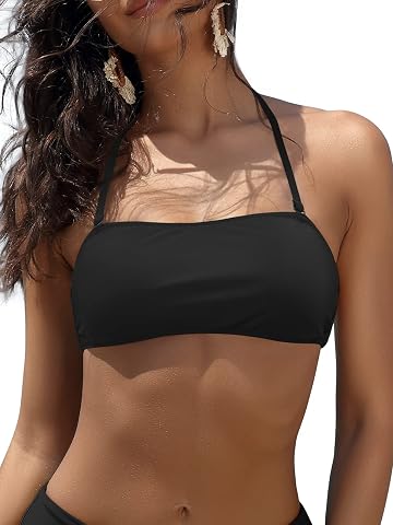 Haut de bikini bandeau noir Shekini en nylon, rembourré et réglable, présenté seul sur pierre claire.
